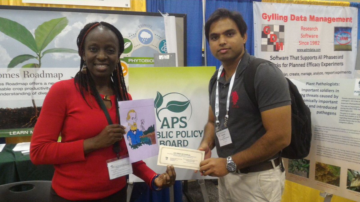 smallowa's tweet photo. Flat de Bary with Renesh Bedre receiving his Gift Certificate for the PPB Drawing ! # Engage your representative #APS2017 @plantdisease https://t.co/TFxWBaSl6F