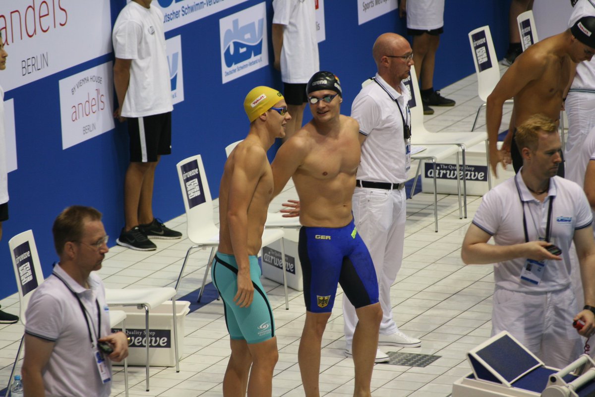kiwirazzi's tweet photo. .@Larkin_mitch and Christian Diener sharing a laugh on the pool deck. #SWCBerlin 

c: mine! https://t.co/8PIURLsDZb