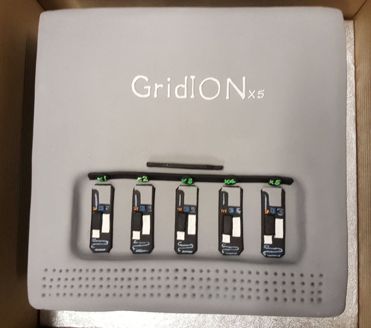 engageWCS's tweet photo. It maybe a miserable day 🌧 but @kim_judge_ has just brightened up🌞 ours with this amazing @nanopore GridION #cake! 🍰 #tastytech #DNA https://t.co/QA7GjFC12M