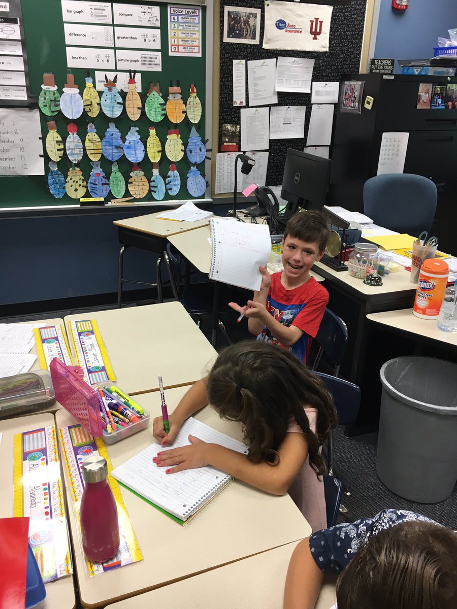 Mr. Gunn's 2nd authors are focused on growing their ideas during Writers' Workshop #EducateExciteExcel