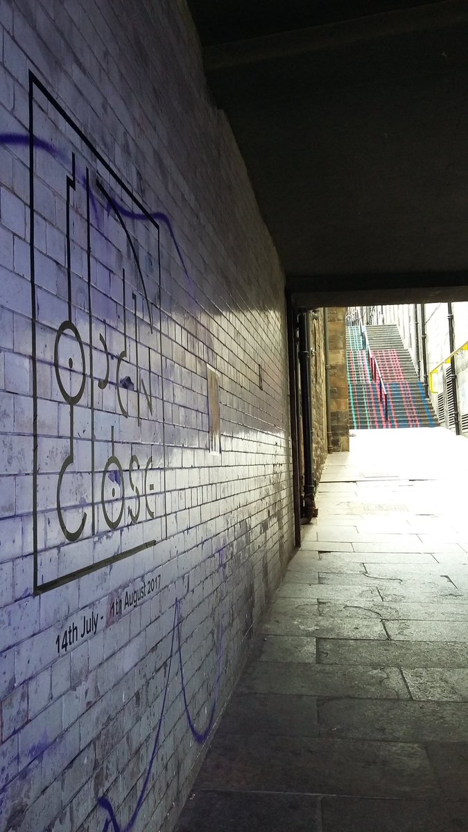 ajentscotland's tweet photo. Catching the ever-changing atmosphere created by @OpenCloseArt in Carrubbers Close #opencloseart #edinburgh https://t.co/R1vCYCQDmN