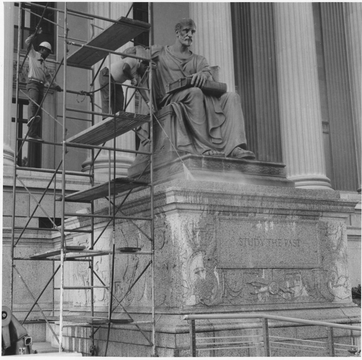 Today's Document on Twitter "Cleaning the statue "Study the Past" in front of USNatArchives 45