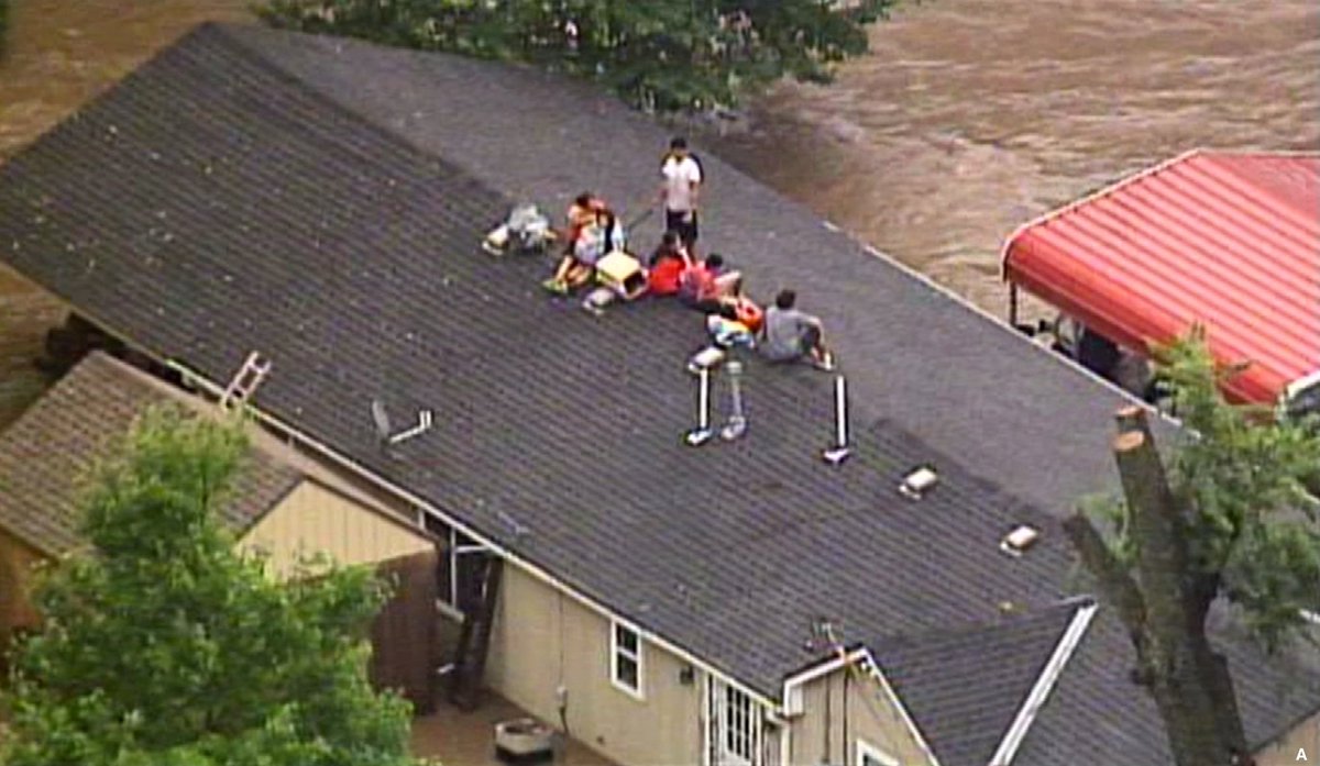 ABC's tweet photo. Authorities have rescued more than a dozen stranded drivers after heavy rains soaked parts of Kansas City, Missouri. https://t.co/ExdxZOE1p1 https://t.co/wQEgOLd5DV