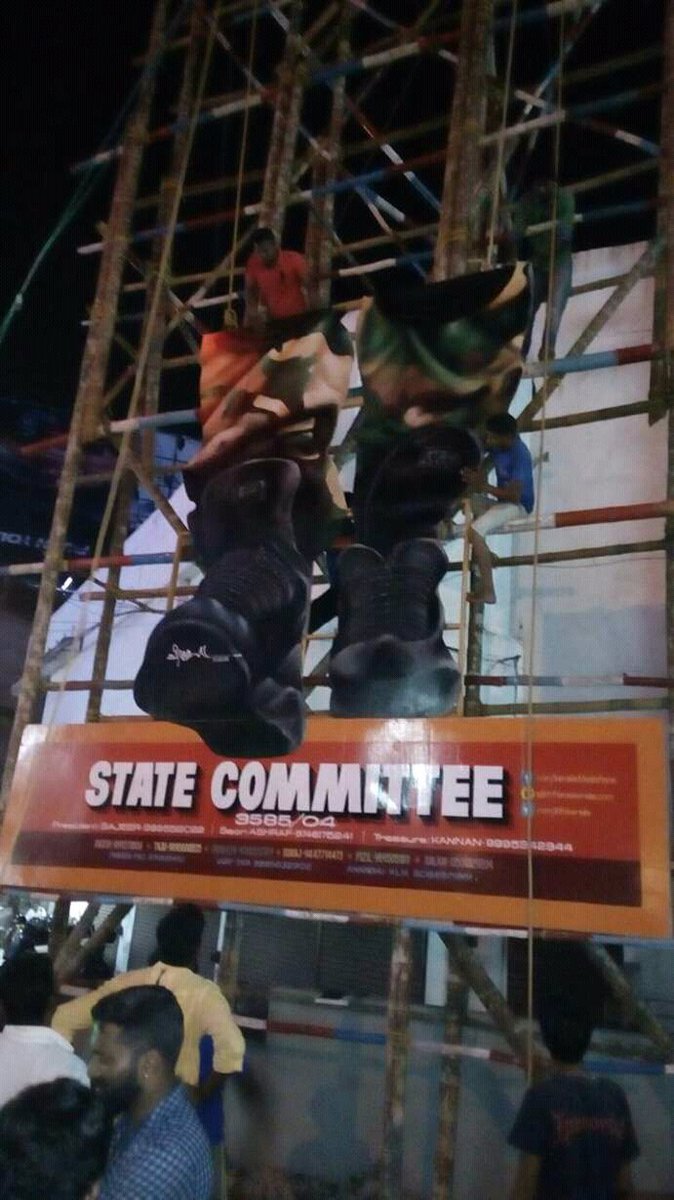 AfcKerala's tweet photo. #ThalaKeralaRecord90FeetCutout First step done with the most precious Legs of our Head.! https://t.co/5bENAn7IQt