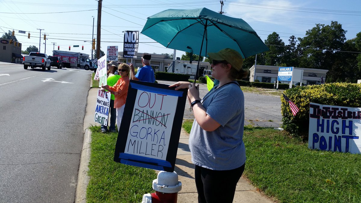 IndivisibleGCo's tweet photo. #TuesdaywithoutTillis with #IndivisibleHighPoint.  Lots of haters today for an anti hate rally.  Super hot out but we persisted. https://t.co/NnXTXaf8Y4