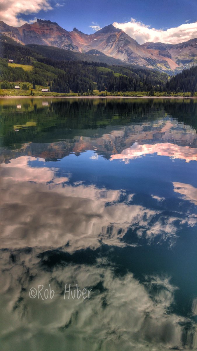 Colorado's tweet photo. Whoa! "@VisitTelluride: The eclipse created beautiful reflections on Trout Lake. Photo: Rob Huber." https://t.co/VKJhYHCNAr