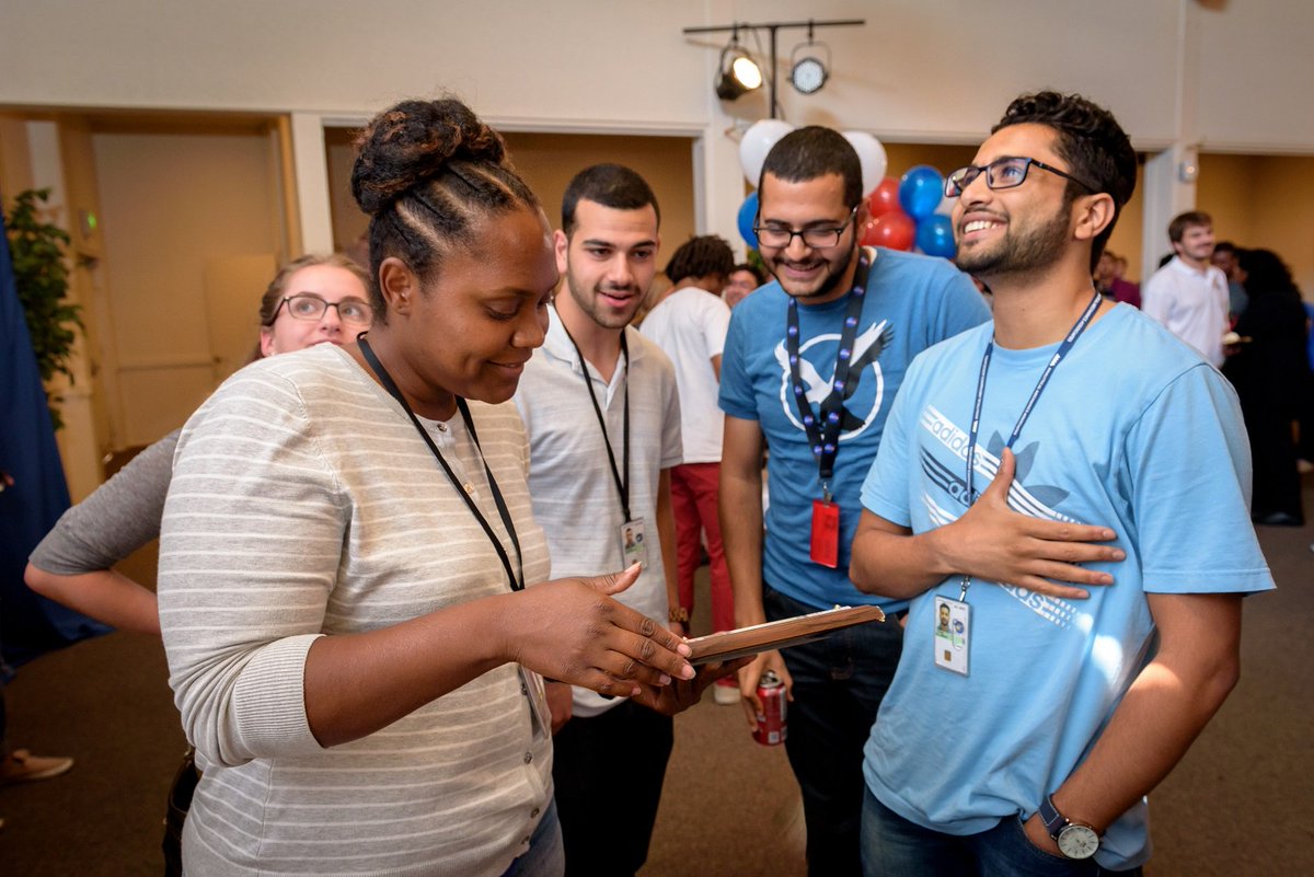 NASAInterns's tweet photo. Interns at @NASAAmes celebrated winning the #InternEclipse challenge after being voted "Best Photo" by thousands of people online! πΈπ« https://t.co/6FPB9jdbYg