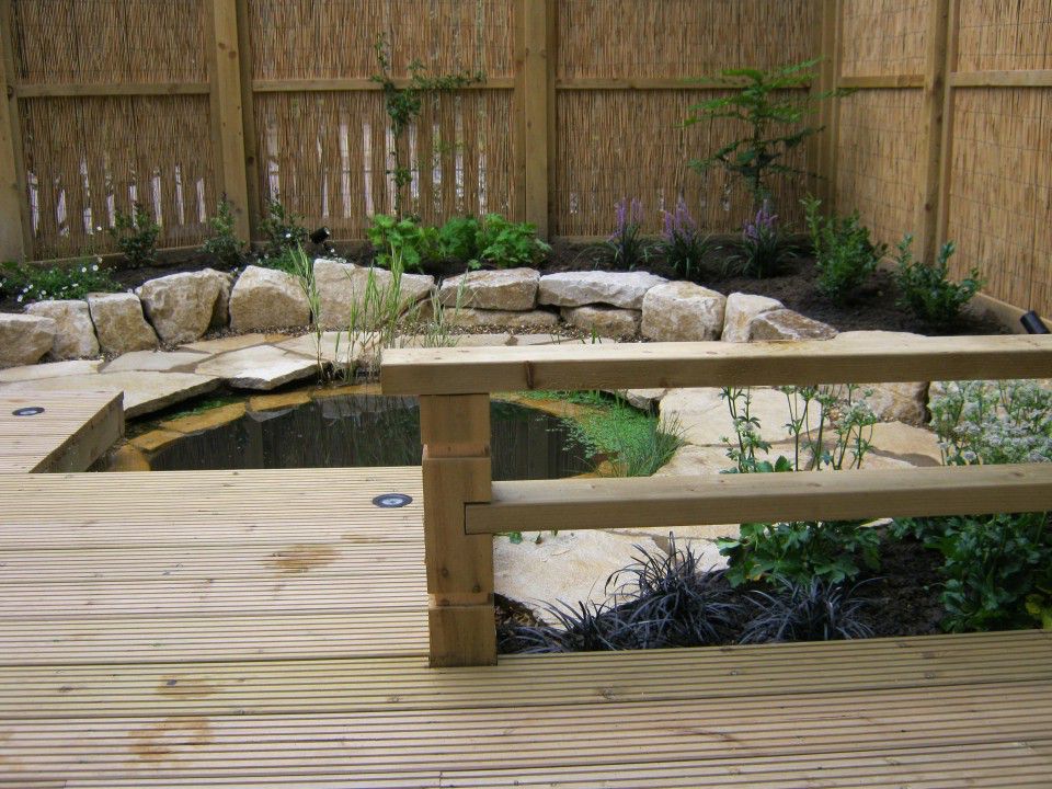 Groundteam's tweet image. Back Garden Decking Garden in Battersea featuring recessed decking lights and ... groundteam.co.uk/landscaping-pr…