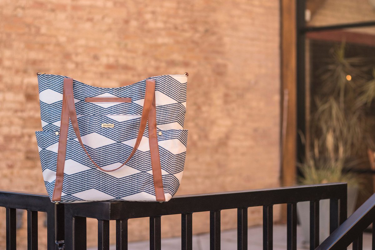 Our Navy Twine Bucket Tote offers a fresh take on a popular print, with zigzag charm and plenty of room. #bag #style amzn.to/2uGec8v