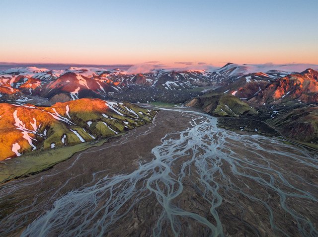 Midnight sun lighting up the landscapes of #Landmannalaugar #Iceland | Credit: <a href="/evosia/">Henry Jun Wah Lee</a> | Shot on #DJI #Inspire