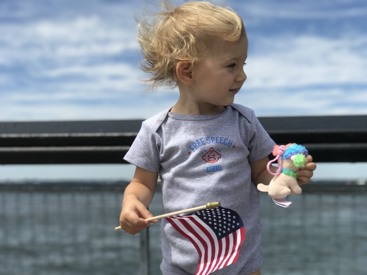 A baby girl holding a flag is now a white supremacist to Democrats