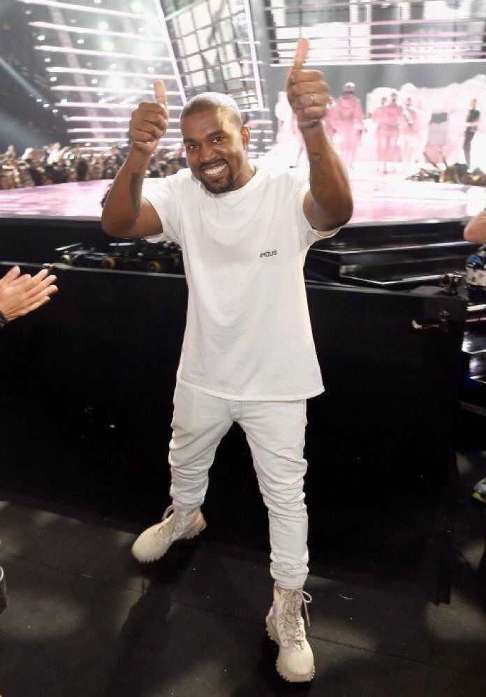 ULTRA RARE PHOTO OF KANYE SMILING… RT FOR GOOD LUCK