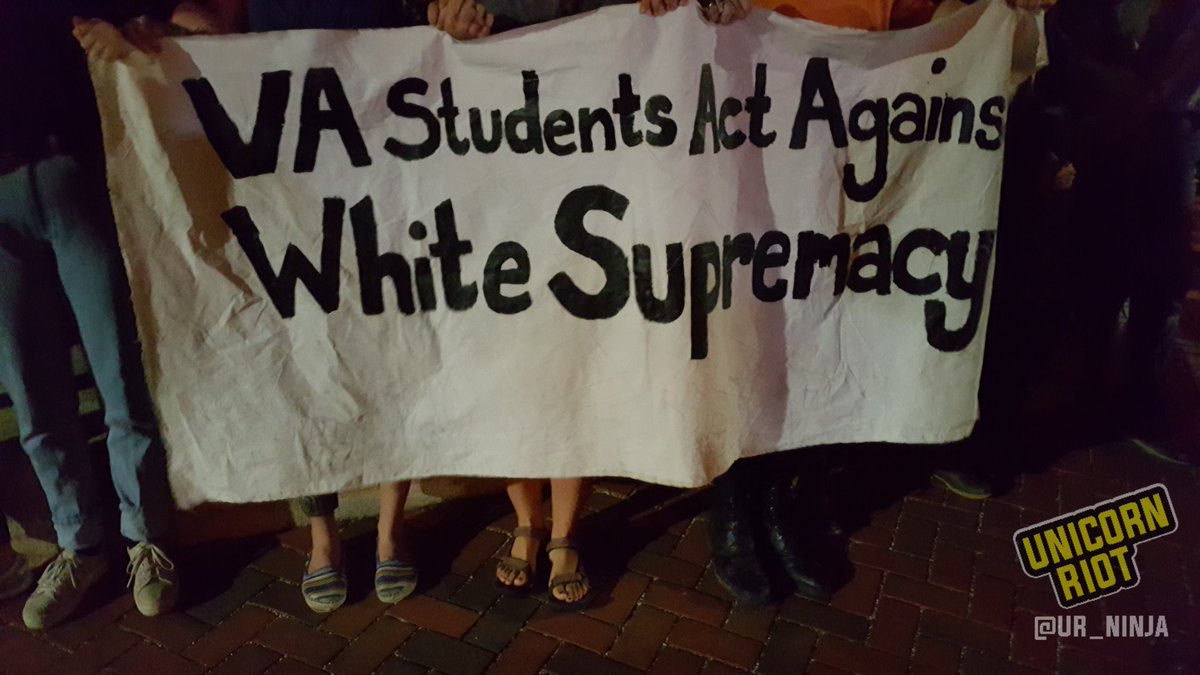 SophiaArmen's tweet image. These are literally young UVA students age 17-23 standing up to a sea of white supremacists and neo-Nazis surrounding them #Charlottesville