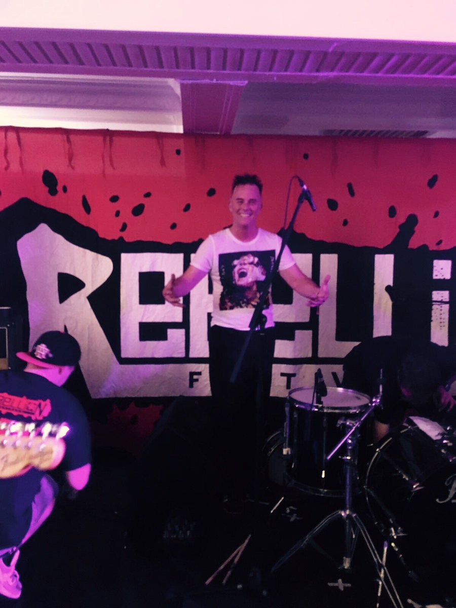 curtisb336's tweet photo. Carter from the Band 13 Bates  at Rebellion wearing his GBtwo Damned White T-shirt : https://t.co/l4dTb2694w https://t.co/P3YpQBStE2