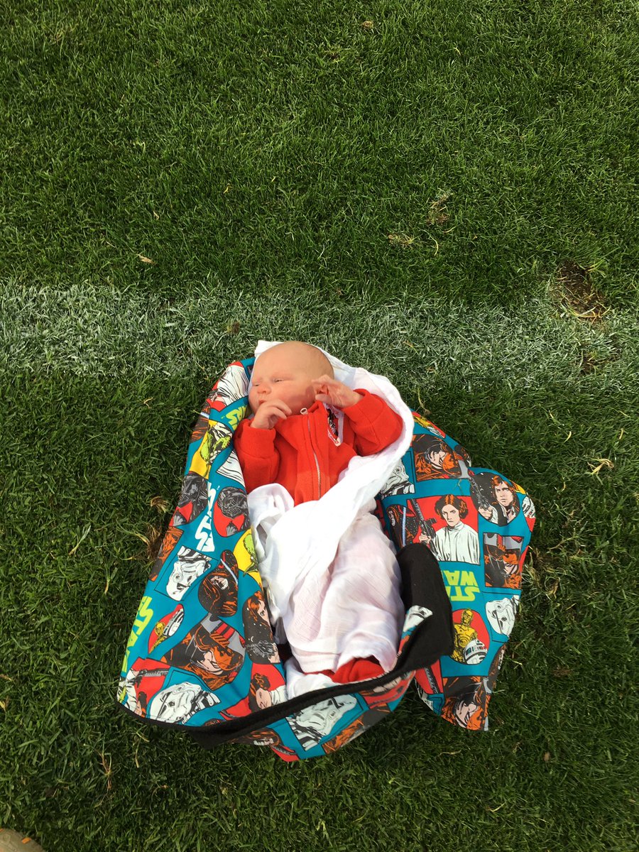 dragondazz's tweet photo. @tariq_sims Good work today champion!My 2day old boy was at his first @NRL_Dragons game today.had to get him onto the field after the game! #redv4life https://t.co/A1Tdmrjp54