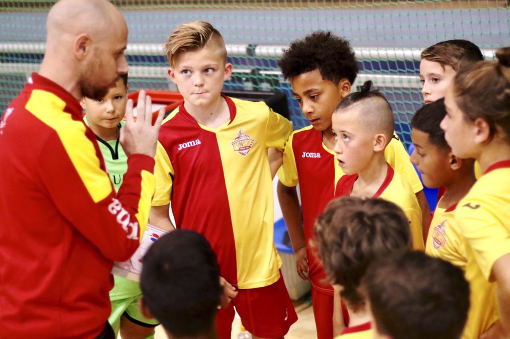 Team Talk: coaches handing out some important tactical information