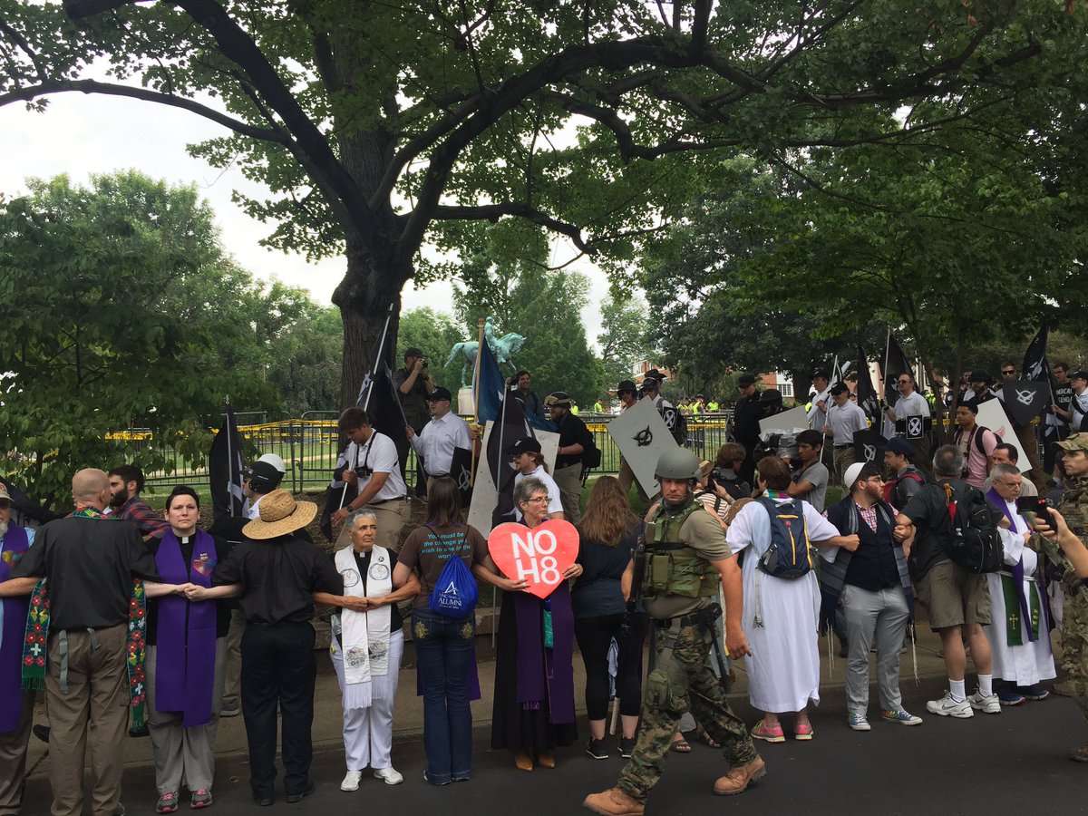 CongregateVille's tweet photo. Clergy sing this little light of mine as Nazis chant "blood and soil" #DefendCVille #NoNewKKK https://t.co/aZWE1tcY1h