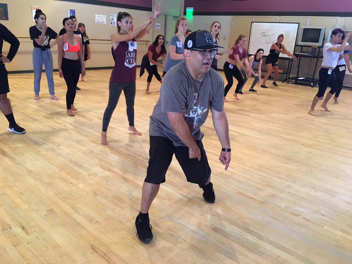 HancockCollege's tweet photo. Instructor Ben Reyes teaches students a move
during Dimensions in Dance auditions today #DimensionsinDance #HancockPride https://t.co/NkP8LRIrUp