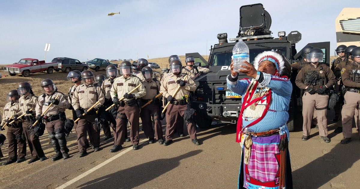 BostonJerry's tweet photo. For comparison, this is how law enforcement responded when native people peacefully protested against the Dakota Access pipeline. https://t.co/b9YYW0NkSs