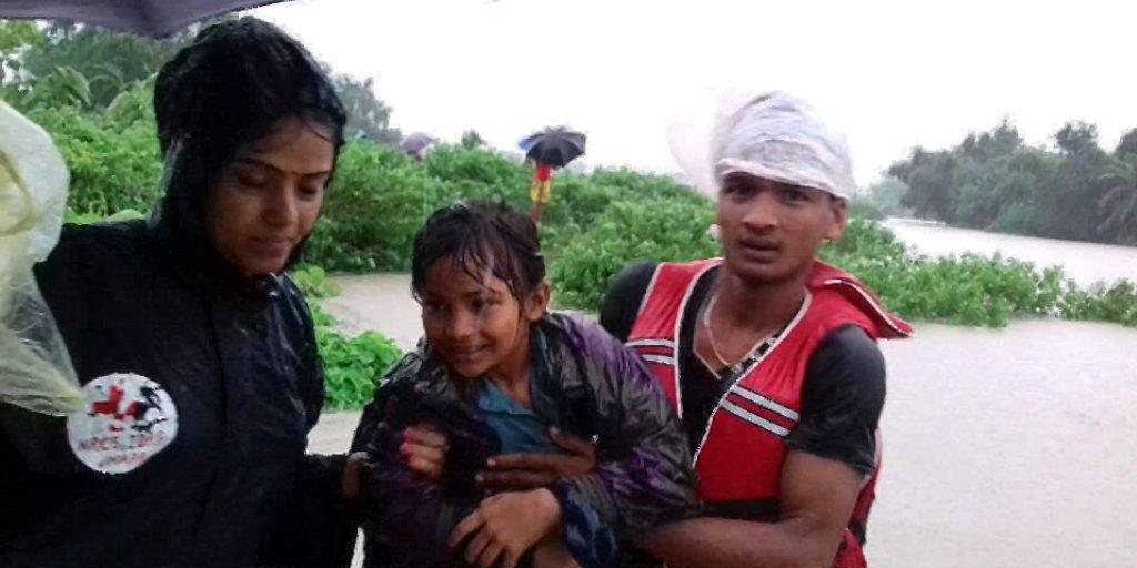 IFRCAsiaPacific's tweet photo. #Nepal #RedCross volunteers are rescuing survivors as landslides and #floods submerge villages in #NepalFlood. https://t.co/yGI0hDzBKT