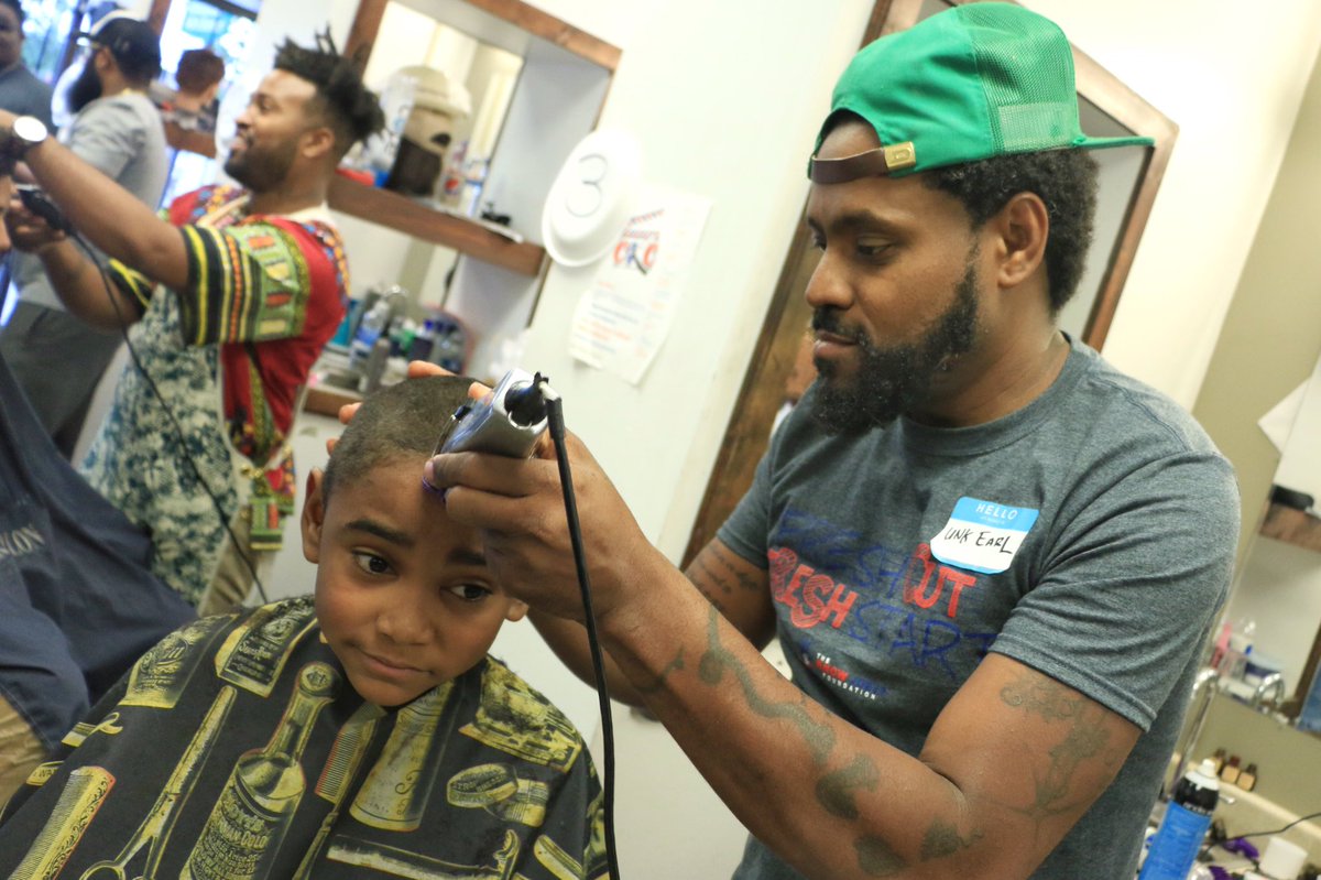 giovanniphotog's tweet photo. .@JoeyCuts & volunteers giving kids a free haircut, book bag & school supplies at #FreshCutFreshStart event. @41actionnews https://t.co/G3XaxfdLb8