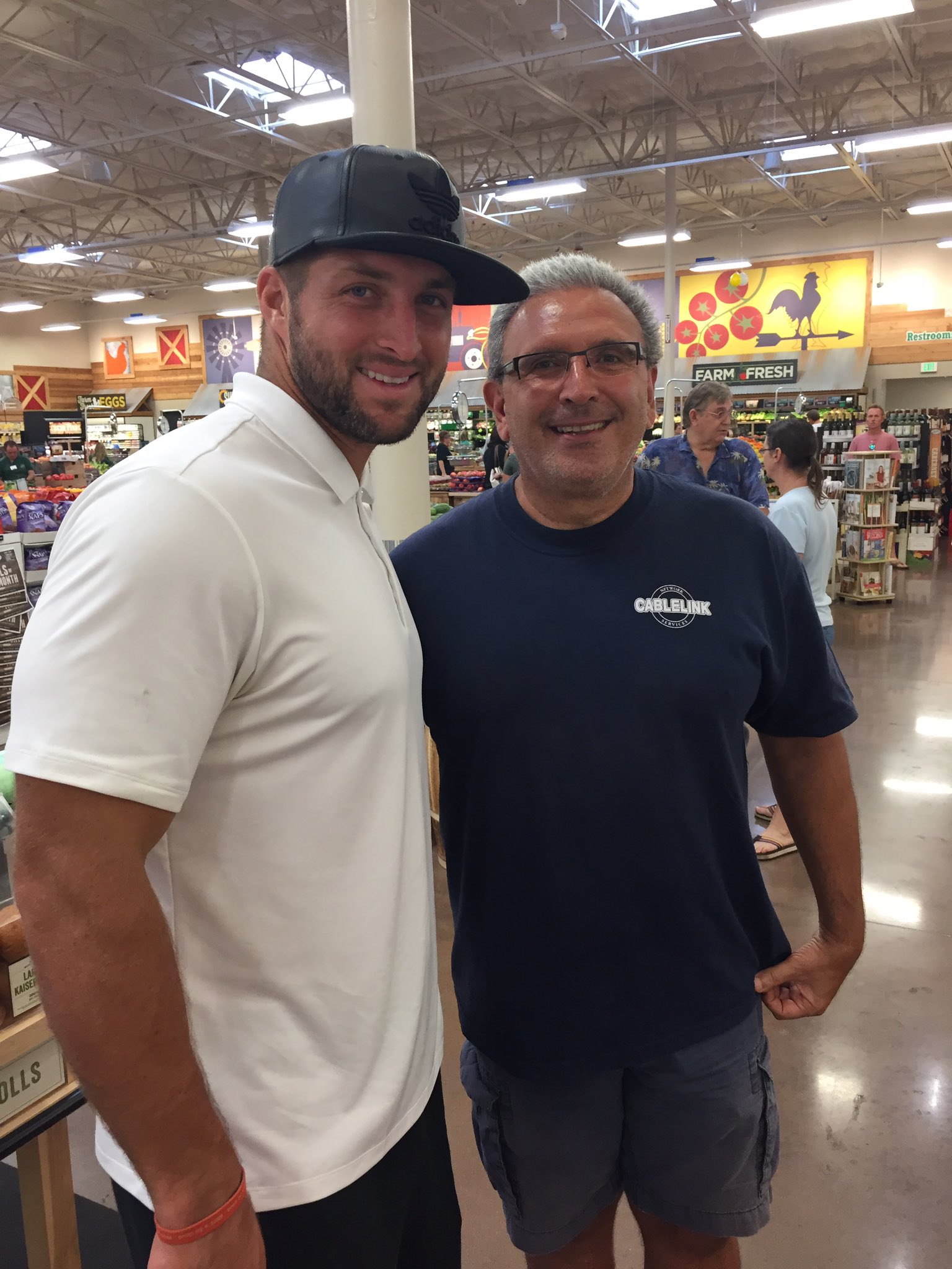 Today\s my dad\s birthday and he met Tim Tebow at the grocery store AND look how happy he is   