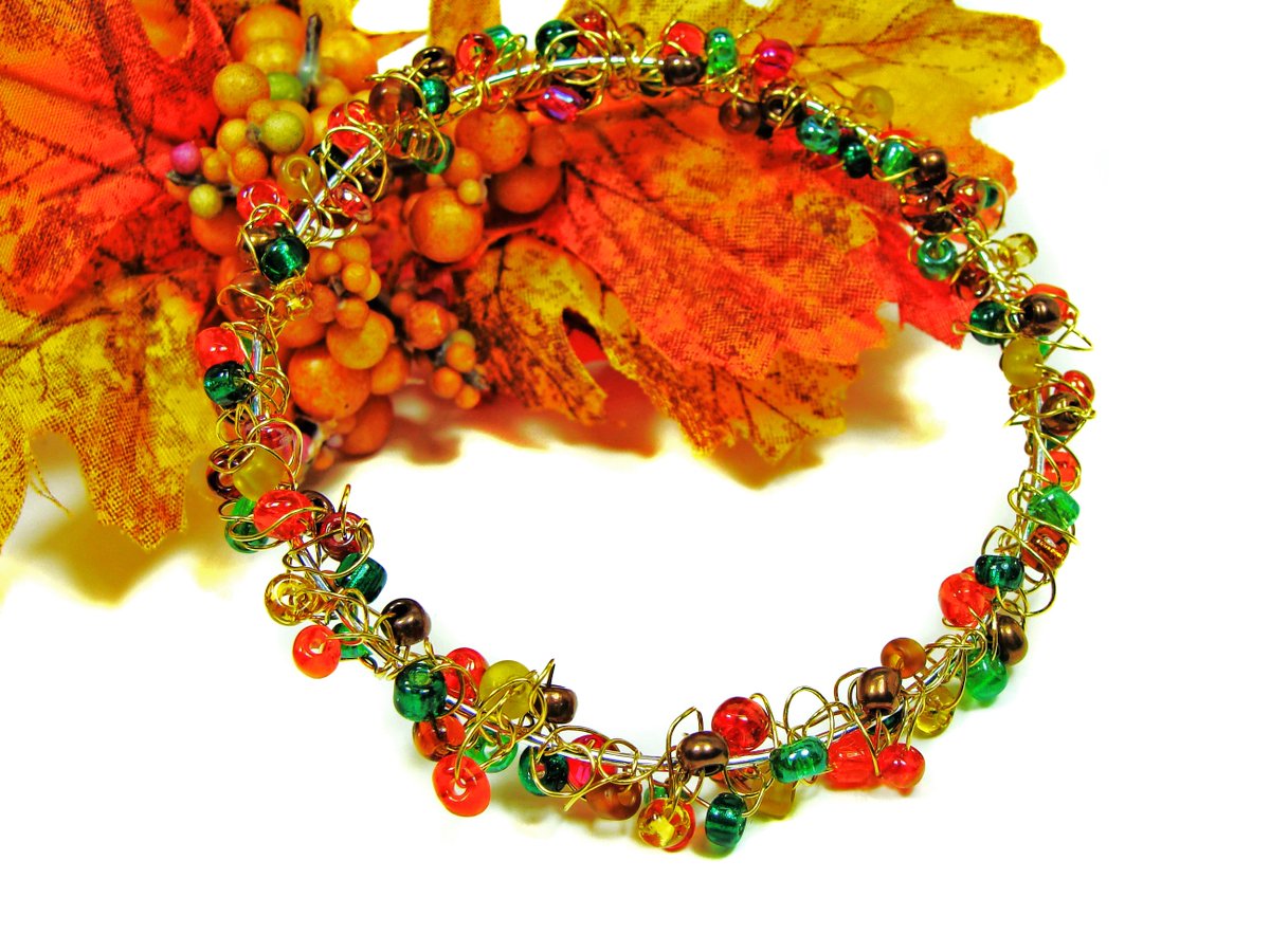girliegals12's tweet photo. Autumn Wire Crochet &amp; Wire Wrap Bangle: https://t.co/jFI5D759Ff #autumnbracelet #orangebracelet #handmadeatamazon #falljewelry #greenbangle https://t.co/uclyhexuGb