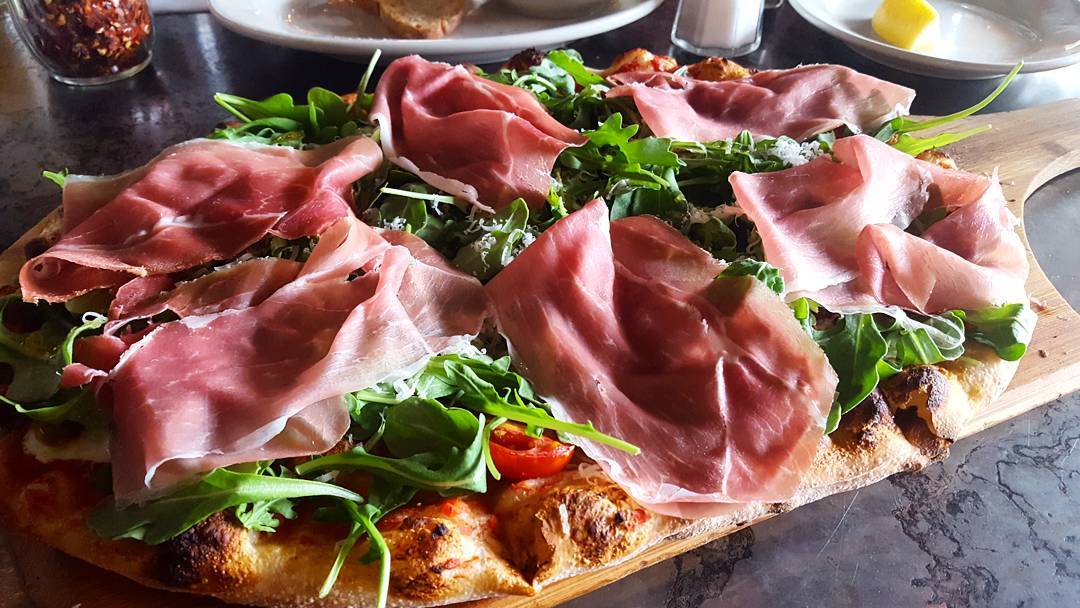 Birravino's tweet photo. Server: "Miss, the pizzas are pretty big..." 
Guest: "Don't worry, it'll be fine!" 
~pizza comes~ 
Guest: 😲🍕😲 https://t.co/1o2kUCuWDL