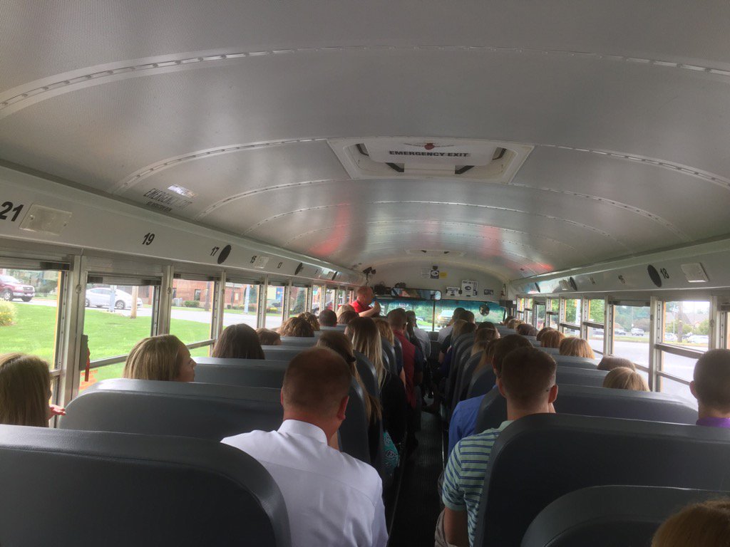 A sign school is just around the corner - new staff members completing a guided school bus tour of the district!