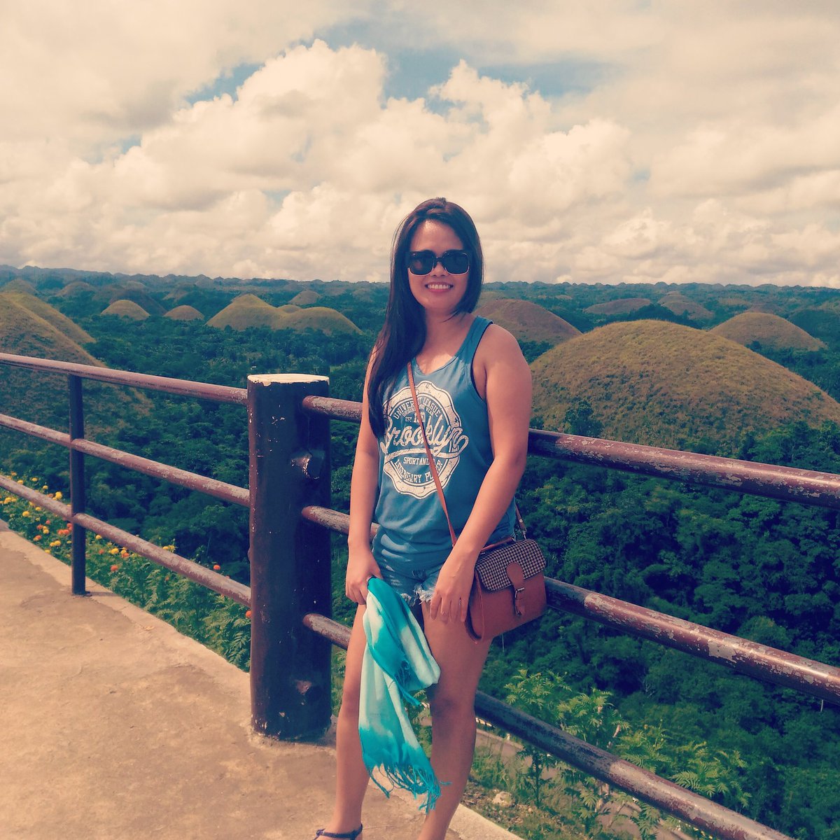vampbutterfly's tweet photo. And what's behind me are giant's poopies from time immemorial. They grew vegetation as time passed. #ChocolateHills #Bohol https://t.co/8oagTgENjm