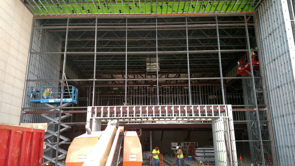 HallAluminum's tweet photo. Installing a curtain wall in Houston for the AMC Theater. Some large glass still to get installed. @Kawneer #movietime #largewall https://t.co/KTfjNC0Z1b