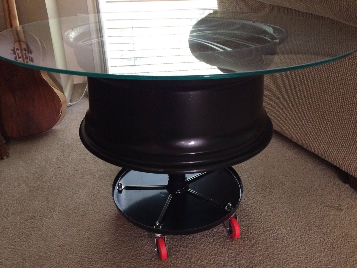 weissinnovation's tweet photo. Selling this #mancave coffee or end table we made from a 19in rim. 21in tall and 30 wide. Stand made fr/ a new shop seat and is adjustable. https://t.co/fzQsg24oJp