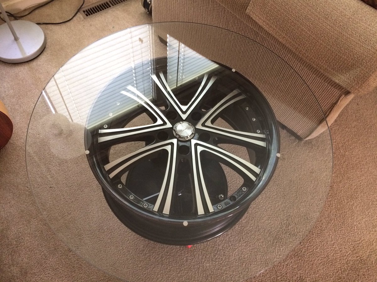 weissinnovation's tweet photo. Selling this #mancave coffee or end table we made from a 19in rim. 21in tall and 30 wide. Stand made fr/ a new shop seat and is adjustable. https://t.co/fzQsg24oJp