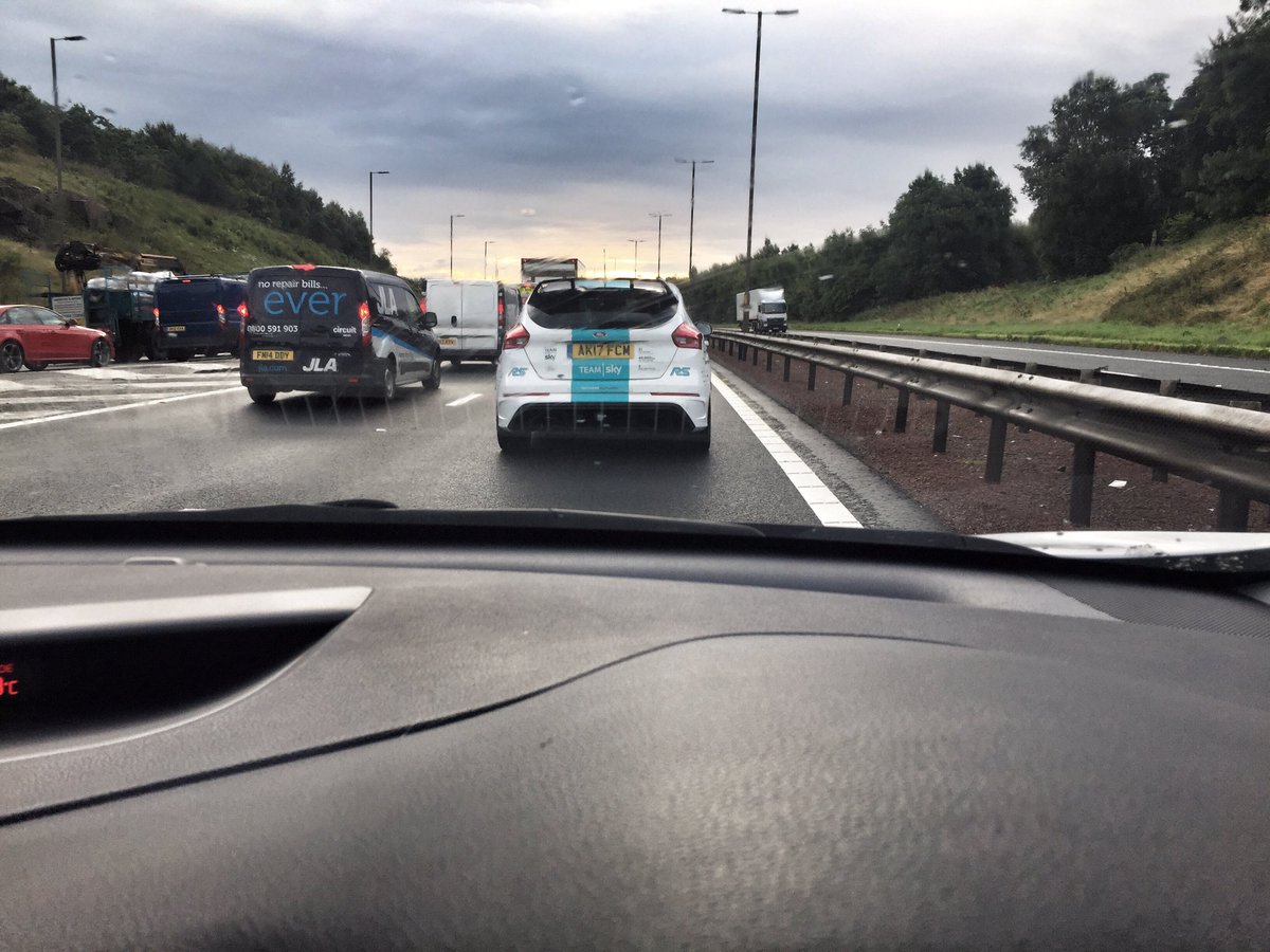 the_names_scott's tweet photo. Thanks @TeamSky @Ford for putting a smile on this cyclists face during the boring commute to work #probablynotreal https://t.co/b6M4qOFKHS