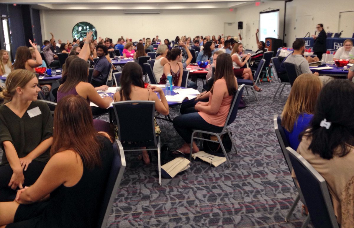 FAUGradCollege's tweet photo. Meeting fellow new grad students! "Raise your hand if you're in the College of #Education." #GradOwls https://t.co/5WKh4hO7gG