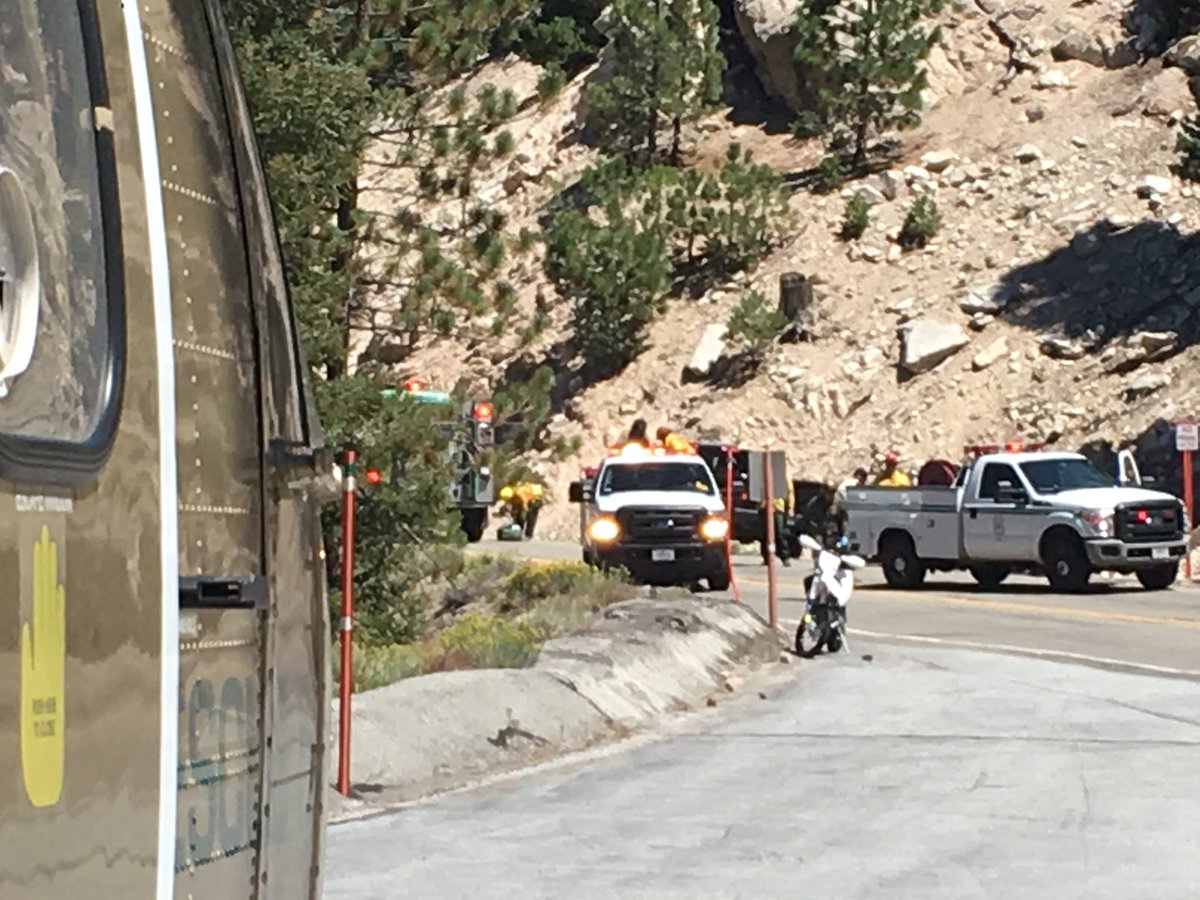 SEBLASD's tweet photo. Motorcycle down, Angeles Crest Hwy mm57, #LASD Air Rescue 5 lands to assist. SEB Tactical Medics treat w/ @Angeles_NF. Airlifting. https://t.co/McH8RZezFM