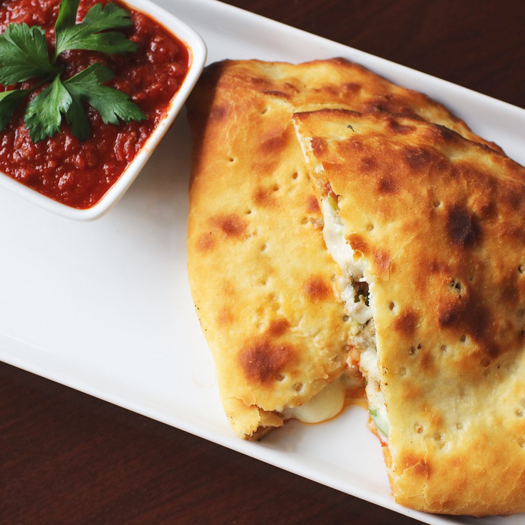 dimilles's tweet photo. You're one-of-a-kind...make your calzone as unique as you are by building your own calzone at DiMille's! https://t.co/ttfwGwSbZp