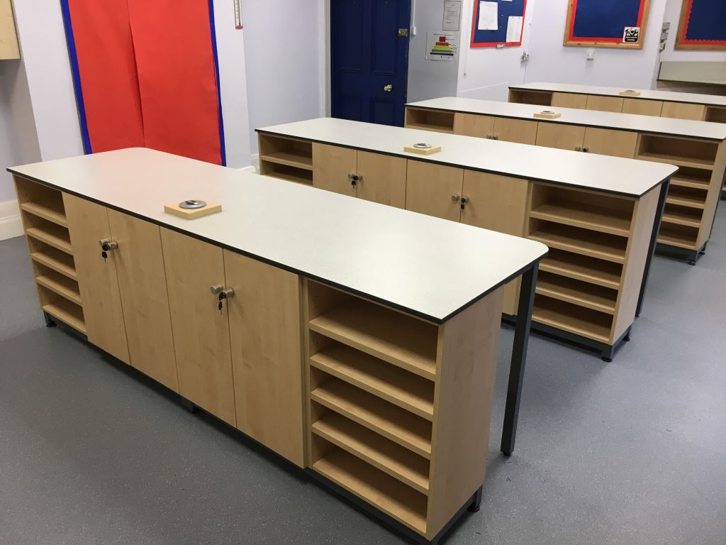 CompassFurnitur's tweet image. A recent job for a school in Colchester. Bespoke science benches and kitchen area with solid grade laminate tops and pull up power.