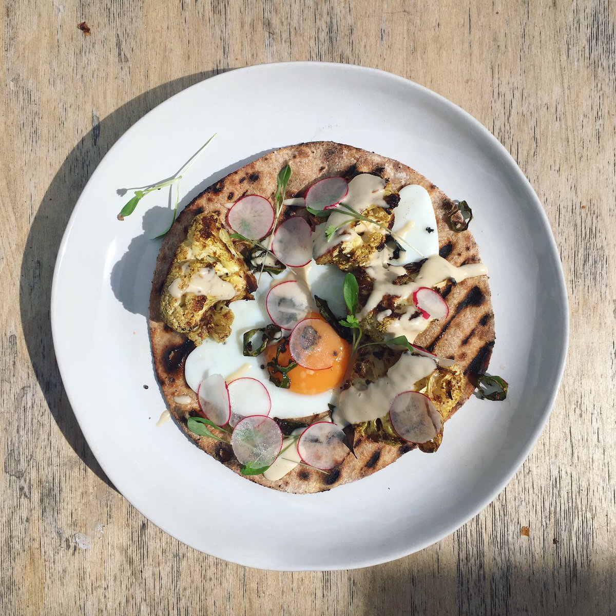 trovefoods's tweet photo. This week's special - spiced cauliflower, tahini, curry leaves + chilli on homemade flatbread with a fried egg. π #trovecafe #weeklyspecial https://t.co/Mr4o7872EV