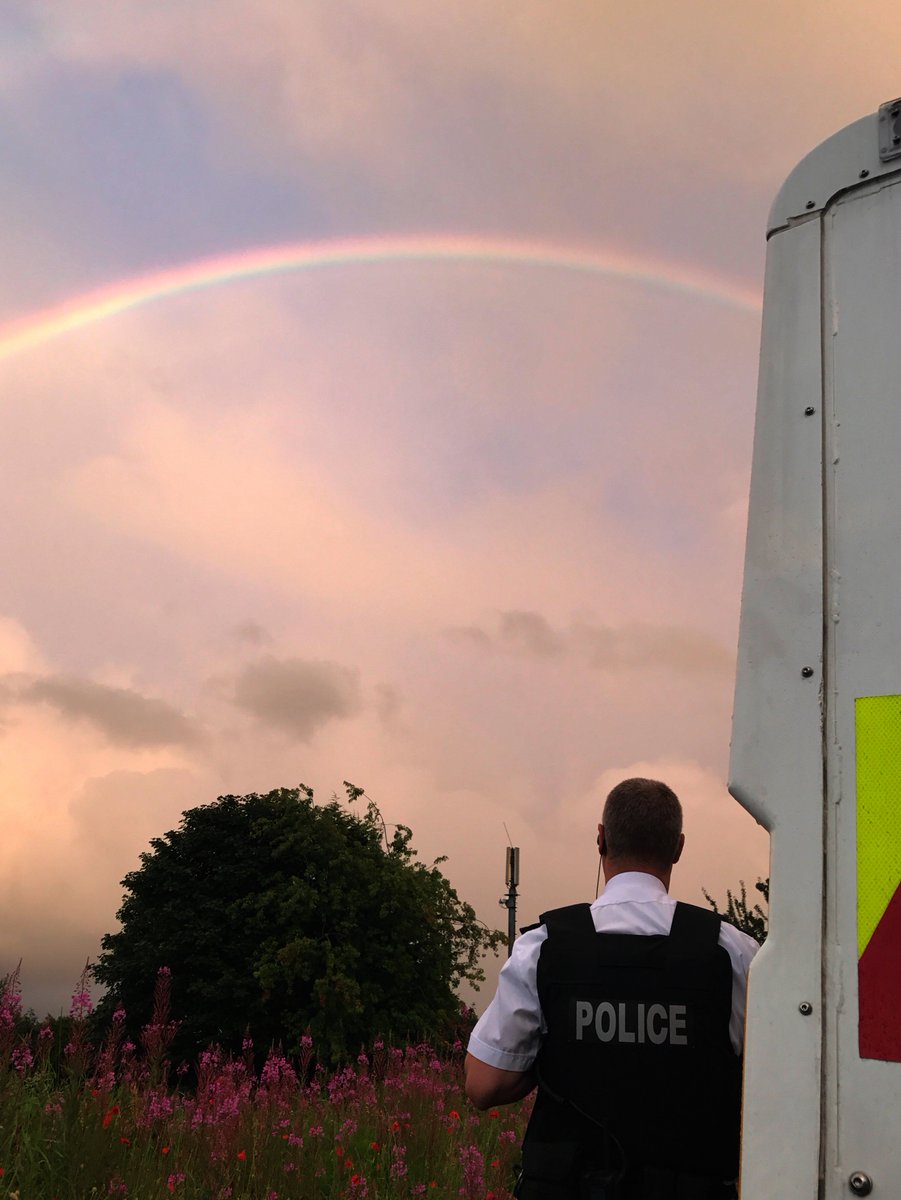 PSNIBelfastN's tweet photo. Tennet St NPT on the ground. What a sight!! #rainbow #wildflowers #dunboyne #SpringfieldRd #strangeskys @barrabest SgtW https://t.co/9yMeSYQxNO