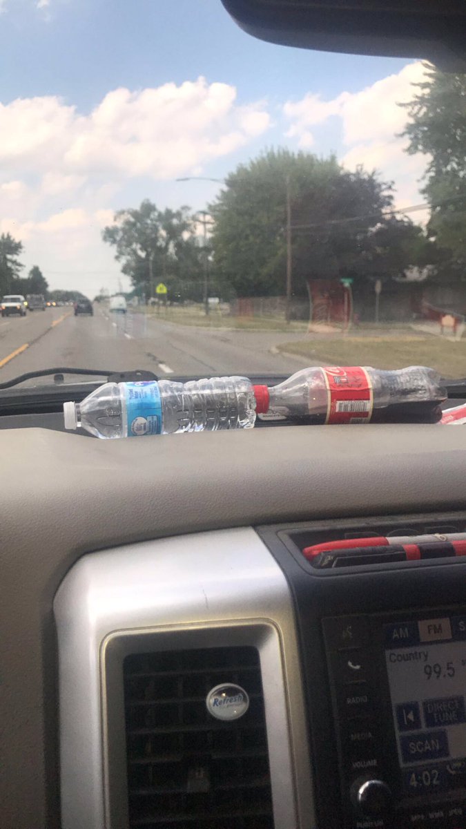 _will2524's tweet photo. Refrigerate your warm drinks on the windshield defroster. #willhack https://t.co/lofMOXF6M2