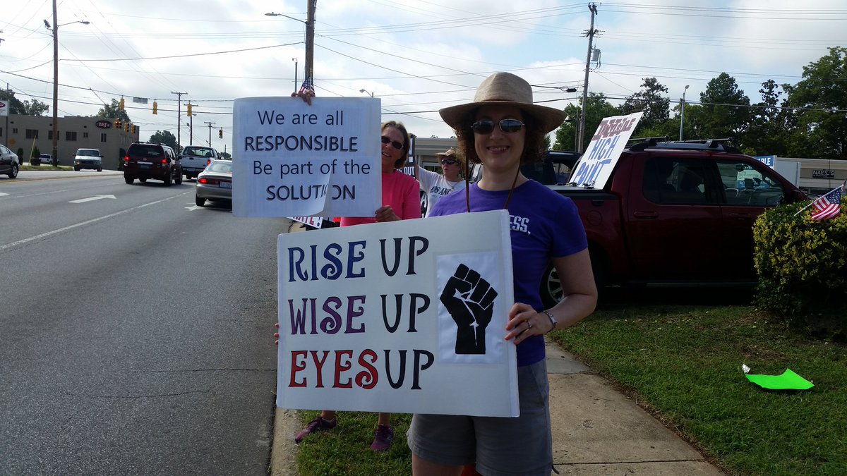 IndivisibleGCo's tweet photo. More photos from yesterday's anti-hate rally for #Charlottsville.  #IndivisibleHighPoint #rejecthate #TuesdaywithoutTillis #RefuseFascism https://t.co/ZNuuyrkqk9