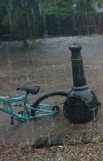 Para_England's tweet photo. A lady was talking photos of the rain storm when she captured this picture. I'm thinking it's pareidolia but creepy nonetheless. https://t.co/alNbX9xpPF