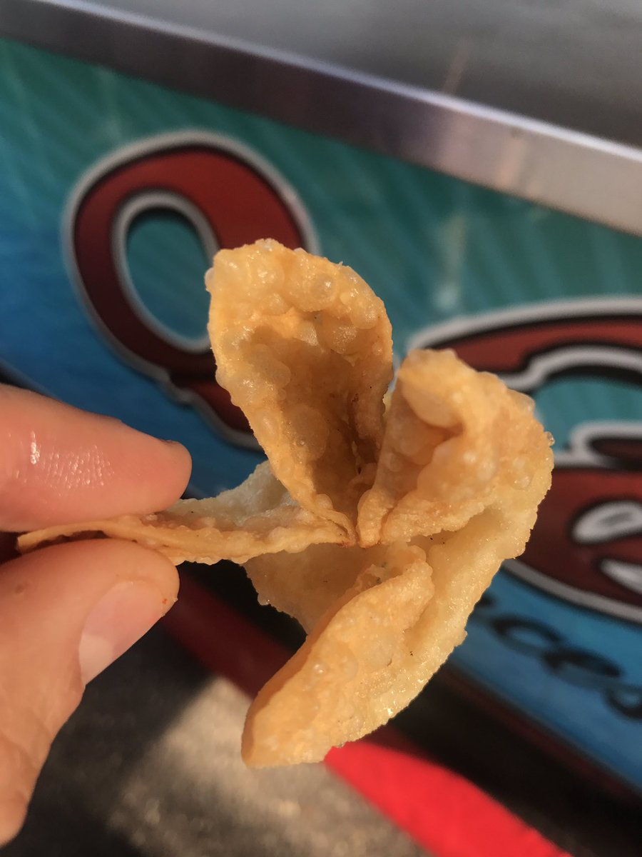 Kudos to new vendor <a href="/QueVietOnAstick/">Que Viet Concessions</a>: $6 for giant egg roll or 7 garlic cream cheese wontons. Egg roll is greasy but yum. #MNstatefair