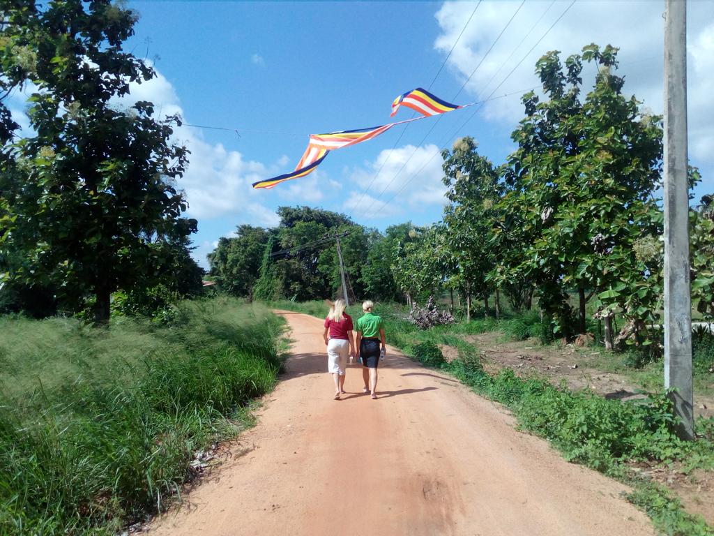 Off the bus &amp; walking to a village to teach English. Join us in paradise all year long.
