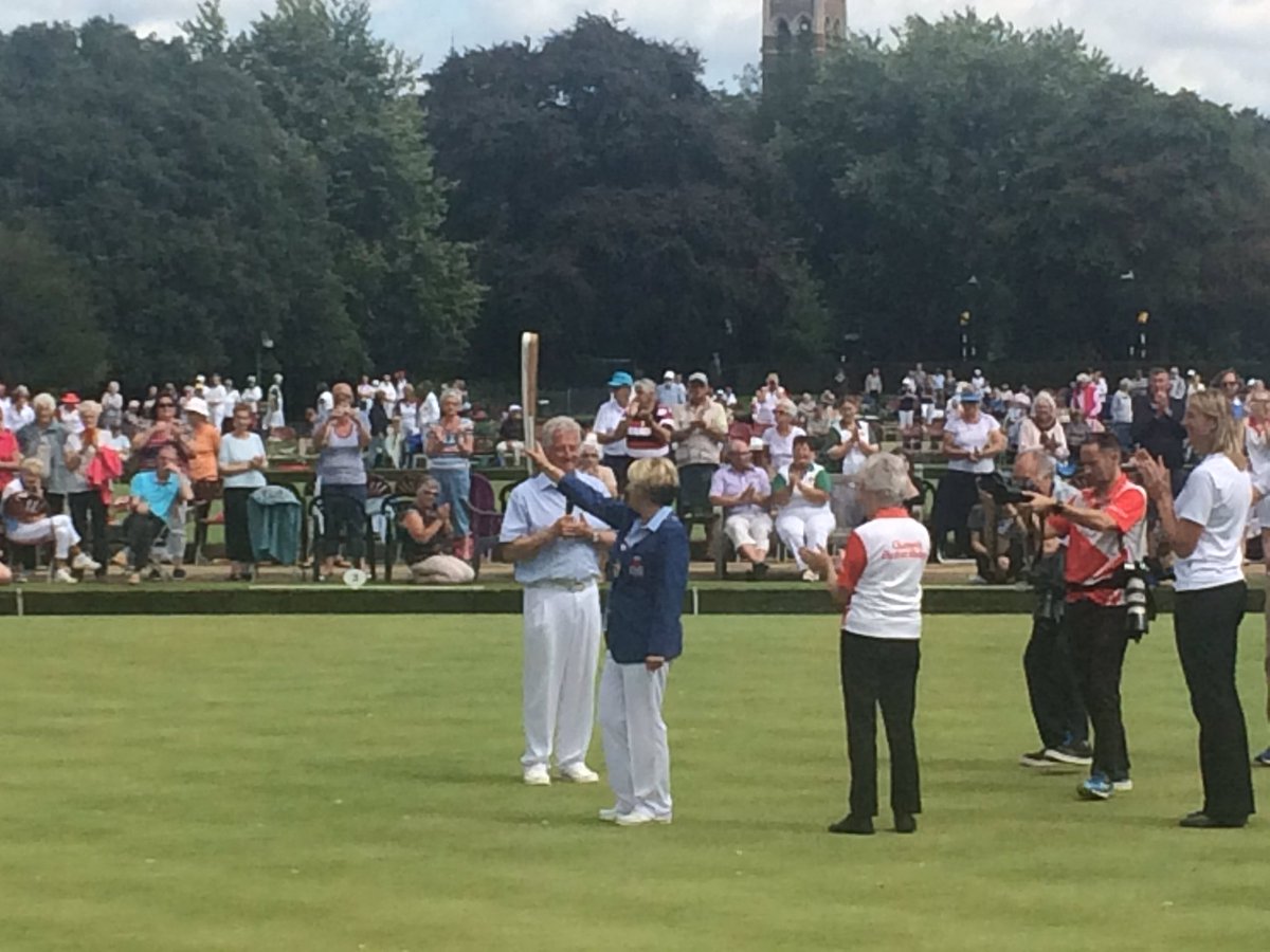 The Queen's Baton arrives at the National Bowls championships at Royal Leamington Spa on its way to the Commonwealth Games in Australia.