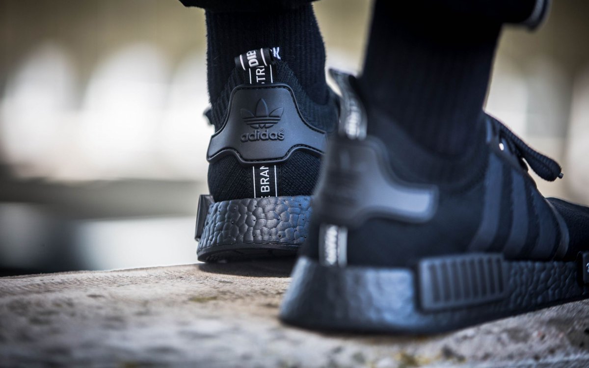 nmd triple black fake