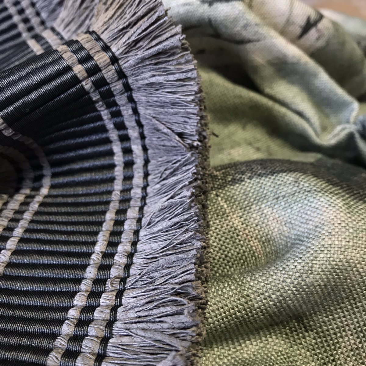 Combining natural colours and texture. We love the soft greens and pinks in this <a href="/ZoffanyFW/">Zoffany</a> fabric. Lucky clients!