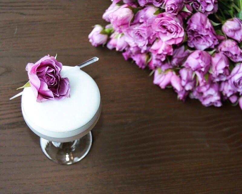 Rosemary infused PSD Candy Manor Gin, Creme de violet, elderflower liqueur, rose, lemon &amp; egg white. #cocktails #garnish #craftcocktails