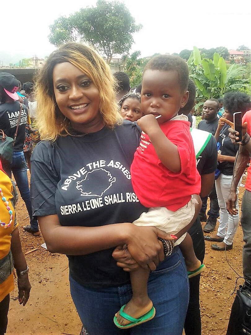 First glimmer of a #Salone smile seen thx 2 Miss Universe of #SierraLeone Beauty Pageant helping suvivors @ Kamayama #SierraLeoneMudSlide
